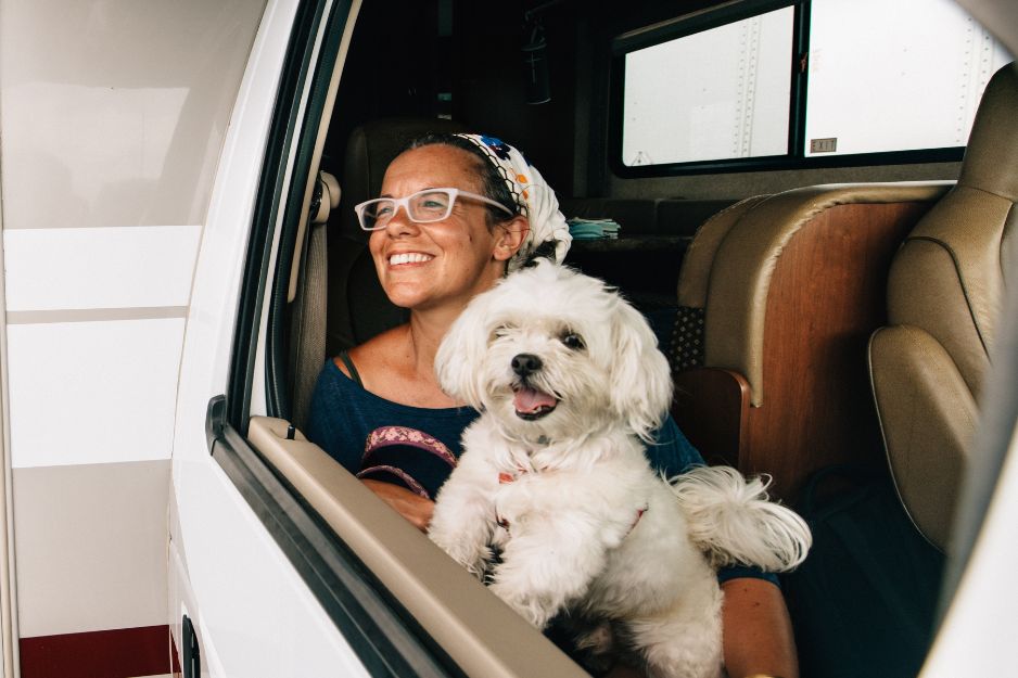 woman and dog in rv