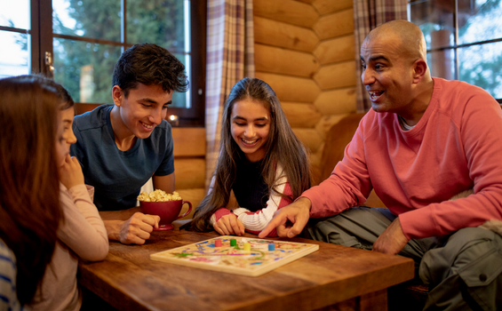 family playing board games